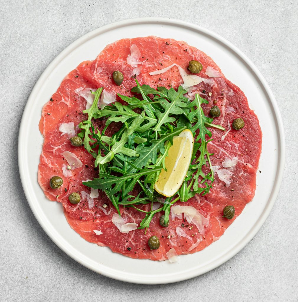 Beef carpaccio with capers, arugula and parmesan